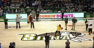 Woman Sinks Half-Court Shot, Wins $500 and Gets a Surprise Marriage Proposal From Dunkin' Donuts Mascot