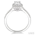 5/8 Ctw Diamond Engagement Ring with 1/3 Ct Oval Shaped Center stone in 14K White Gold