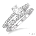 3/4 Ctw Diamond Wedding Set With 5/8 ct Oval Shape Diamond Engagement Ring and 1/6 ct Wedding Band in 14K White Gold