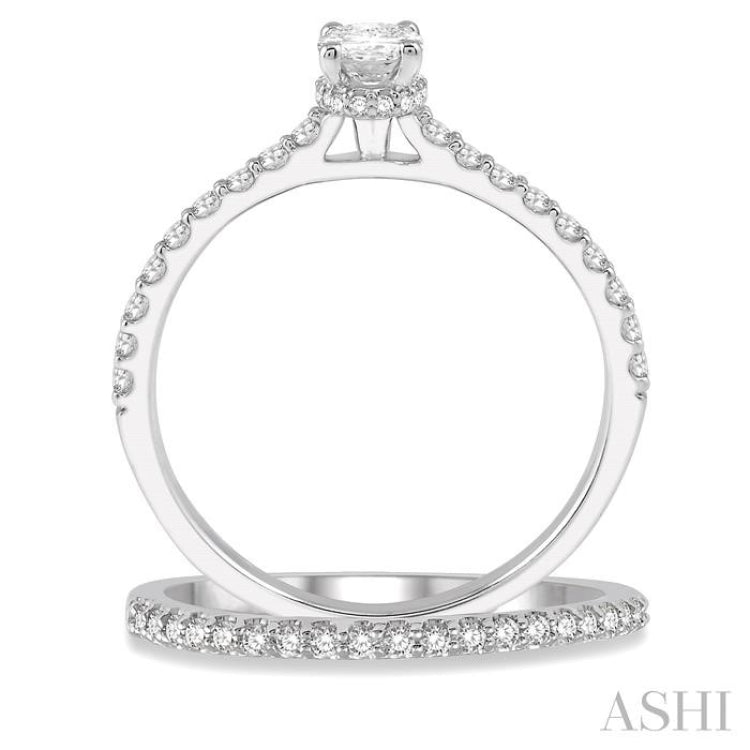 3/4 Ctw Diamond Wedding Set With 5/8 ct Oval Shape Diamond Engagement Ring and 1/6 ct Wedding Band in 14K White Gold