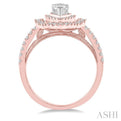 3/4 ctw Pear Shape Center Semi-Mount Round Cut Diamond Engagement Ring in 14K Rose and White Gold