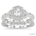 3/4 ctw Round Cut Diamond Wedding Set With 5/8 ctw Oval Cut Engagement Ring and 1/10 ctw Wedding Band in 14K White Gold