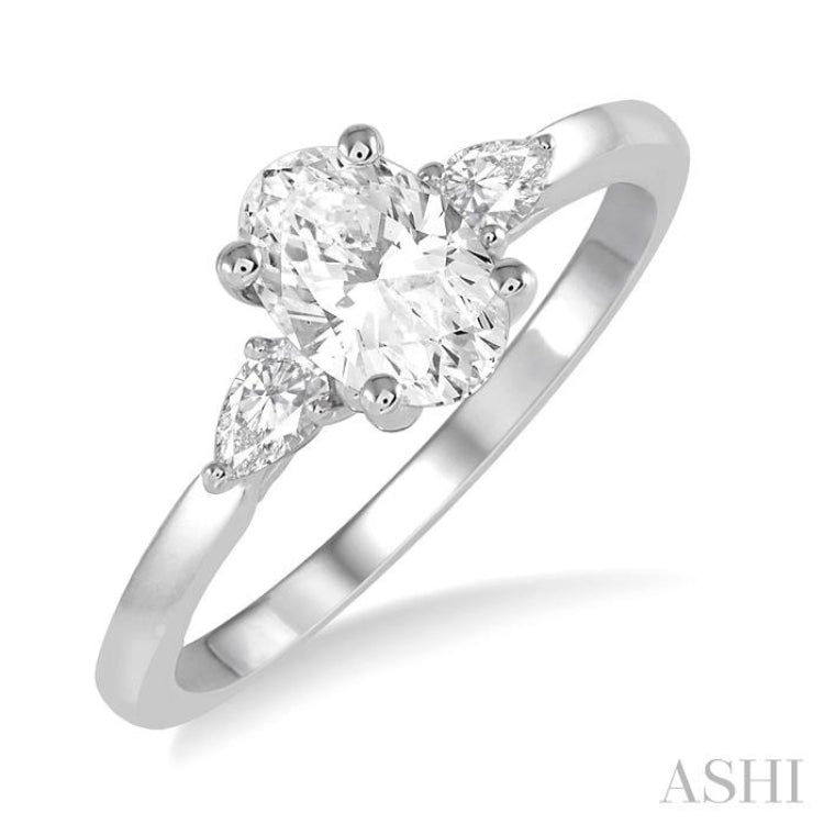 1/5 ctw Pear Cut Diamond Semi-Mount Engagement Ring in 14K White Gold