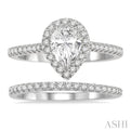 1 1/4 Ctw Round Cut Diamond Wedding Set With 1 1/10 ct Pear Cut 3/4 ct Center Stone Engagement Ring and 1/5 ct Wedding Band in 14K White Gold