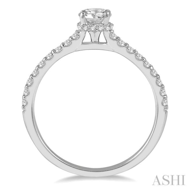 1/5 Ctw Round Cut Diamond Semi Mount Engagement Ring in 14K White Gold