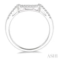 1/8 Ctw Trough Shape Center Round Cut Diamond Wedding Band in 14K White Gold