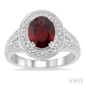 9x7 MM Oval Cut Garnet and 1/20 Ctw Round Cut Diamond Ring in Sterling Silver