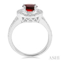 9x7 MM Oval Cut Garnet and 1/20 Ctw Round Cut Diamond Ring in Sterling Silver