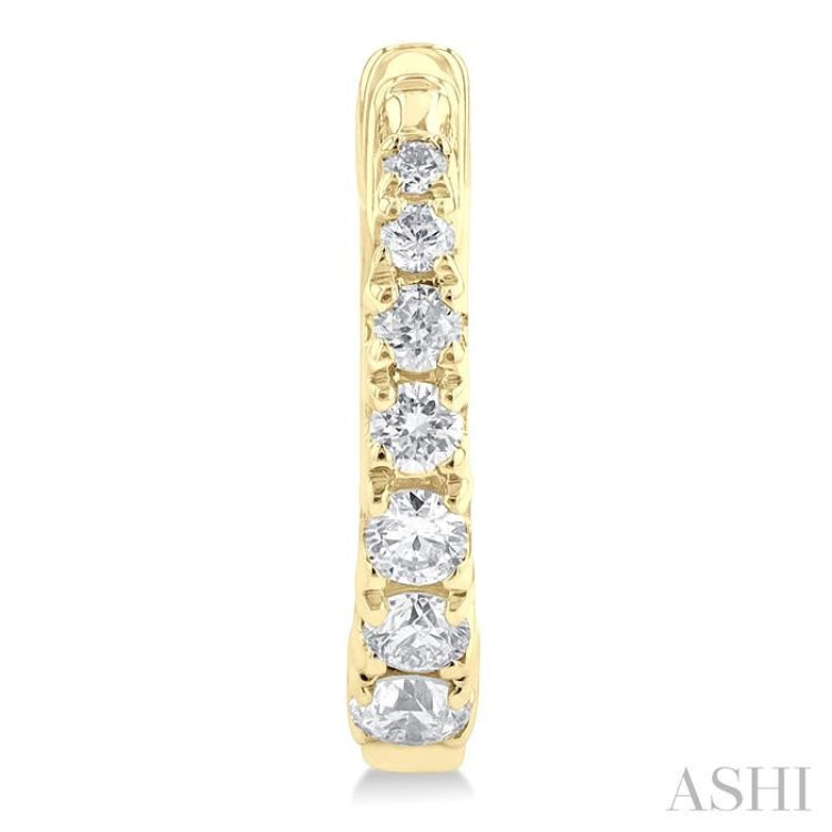 1/4 ctw Graduated Round Cut Diamond FAshion Huggies in 10K Yellow Gold