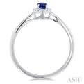 1/20 ctw Round Cut Diamond and 5X3MM Oval Shape Sapphire Halo Precious Ring in 10K White Gold