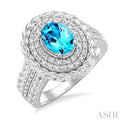 1/20 ctw Oval Cut 9X7MM Blue Topaz and Round Cut Diamond Semi Precious Ring in Sterling Silver