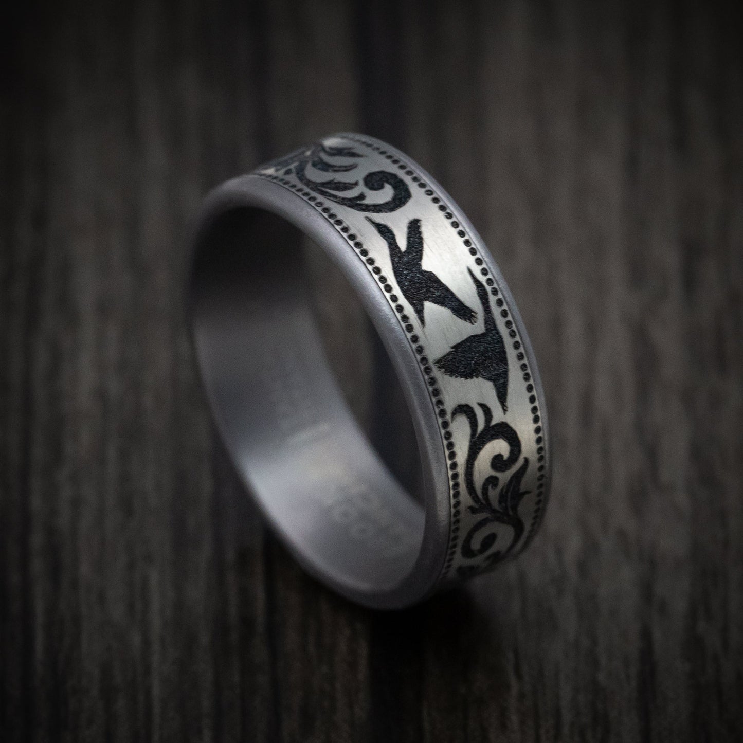 Tantalum and Black Titanium Flying Duck and Script Pattern Ring